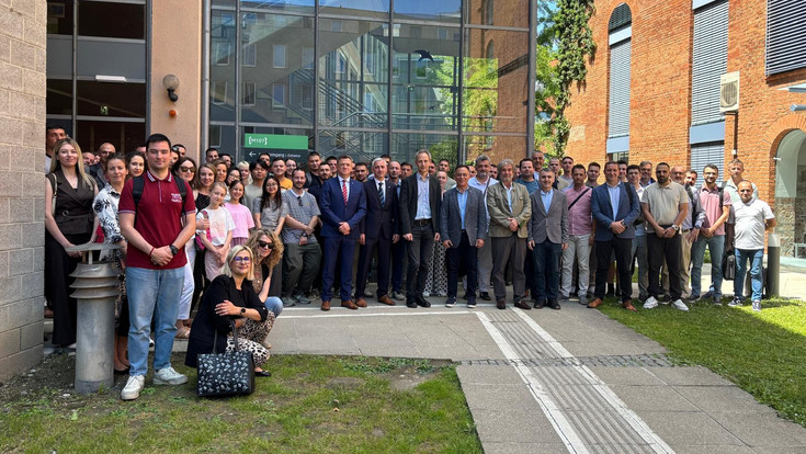 Group photo of the organisers and participants of CEEPUS Summer School 2026 in front of a BOKU University building