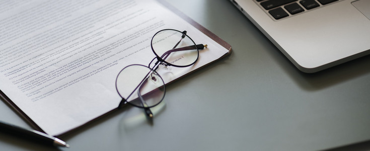 laptop, glasses, pen