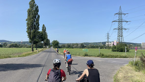 Students are on the road with bicycles