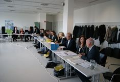 image: General Assembly_participants sitting in U-shape