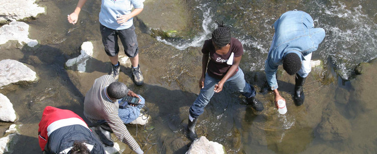 BOKU students taking measurements in a river (Schwechat, Danube - Austria)
