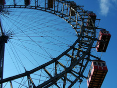 Ferris wheel with blue sky in the background