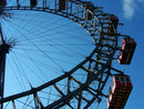 Ferris wheel with blue sky in the background