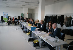 image: General Assembly_participants sitting in U-shape